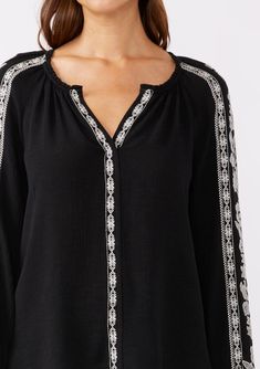 A classic boho blouse with long raglan sleeves and contrast embroidered detail throughout. Embroidered detail Relaxed fit Long raglan sleeve Single-button wrist closure Split v-neckline Bohemian blouse Dry clean recommended or hand wash cold Classically boho for any season, our effortlessly relaxed blouse is crafted from a viscose and linen blend. Featuring contrast embroidered details, long raglan sleeves, and a split v-neckline. Tuck this effortless everyday top into vintage denim and add a cl Cotton Jackets Women, Blouse With Long Sleeves, Bohemian Blouse, Bohemian Dresses, Western Buckles, Bohemian Blouses, Bohemian Tops, Jackets Women, Boho Blouse