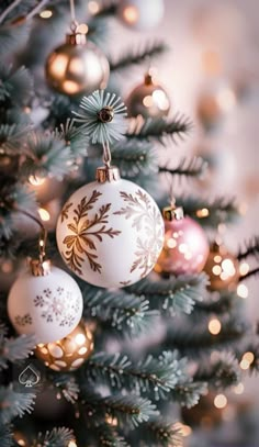 a christmas tree with ornaments hanging from it