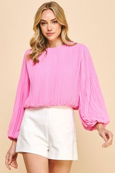 Introducing our Pleated Woven Top, made from a soft and elegant pleated fabric. Its round neck adds a touch of sophistication, while the bishop sleeves provide a flattering and stylish look. Falling right above the waistline, this top is perfect for any occasion. Billowy Pleated Sleeve Blouse For Spring, Billowy Blouse With Pleated Sleeves For Spring, Spring Long Sleeve Top With Puff Sleeves, Chic Puff Sleeve Bishop Top For Spring, Chic Pleated Waist Spring Tops, Spring Tops With Pleated Bishop Sleeves, Spring Blouse With Pleated Bishop Sleeves, Spring Fitted Blouse With Pleated Sleeves, Chic Pleated Sleeve Top For Party