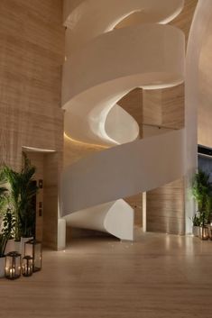 a spiral staircase in the middle of a building