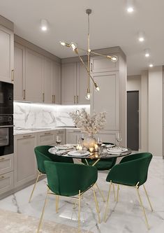 a dining room table with green chairs and a white marble counter top in front of an oven