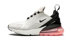 The Nike Air Max 270 Flyknit delivers a streamlined look.  The lifestyle runner has a white and black color colorway with light pink accents, and the Nike Air Max 270 Flyknit is grounded nicely with a black and pink outsole.  An airy Flyknit upper helps keep you cool when things get hot, and the distinct clear Air Max heel unit is Nike's largest yet.  Other details include an exaggerated tongue top, a heritage logo, and a futuristic “AIR” on the heel. Pink Nike Air Max, Pink Nike Air, Nike Air Max Pink, Buy Nike Shoes, Cute Summer Shirts, Stadium Goods, Sneakers For Women, Pink Nikes, Nike Air Max 270