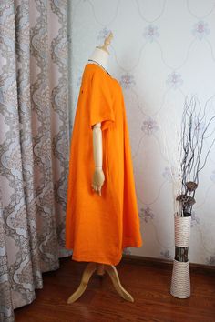 "【Fabric】 Cotton, linen 【Color】 orange 【Size】 Shoulder width 39cm/ 15.2\" Sleeve Length 29cm / 11\" Cuffs around 40cm / 6\" Bust 114cm / 45\" Waist circumference 170cm/ 66\" Length 112cm / 44\" Hem circumference 236cm/ 92\" Washing & Care instructions: -Hand wash or gently machine washable do not tumble dry -Gentle wash cycle (40oC) -If you feel like ironing (although should not be necessary) , do it with steam or while the dress is still slightly wet -Do not bleach If you like this dress, p Casual Orange A-line Maxi Dress, Orange Cotton Midi Dress With Short Sleeves, Orange Cotton Dress With Pockets, Orange Short Sleeve Dress With Pockets, Short Sleeve Linen Maxi Dress, Casual Orange Linen Dress, Linen Maxi Dress For Summer, Long Linen Maxi Dress For Summer, Summer Dress Linen