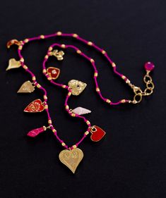 LOVE CHARM NECKLACE DETAILS: *Charms: ELEVEN Gold plated charms. Hearts, shell, fist, moon, cherries. *Cord: Hand knotted on hot pink color cord. *Clasp: Lobster. *Extension chain. *Select your size from the drop down menu. PROCESSING TIME: *4-6  business days.  All the jewelry on my site is made by me with love and care. ❤️ GIFT WRAP OPTION: *You can select gift wrap option. Your gift will arrive in a branded Alison Storry Jewelry pouch inside a    branded box. You can also request a message to be included on a small card. SPECIAL OFFERS: You can sign up to my news letter to hear about upcoming sales, new offers and new collections. http://www.eepurl.com/uHhYL www.instagram.com/jewelrybyalisonstorry Lucky Charm Necklace, Hand Knotted Necklace, Diy Collier, Heart Charm Necklace, Hot Pink Color, Necklace Love, Hearts Necklace, Funky Jewelry, Stacked Jewelry