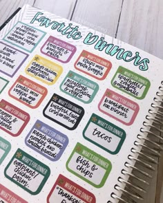 a planner with some stickers on it and the words favorite dinners written in different languages