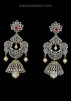 18 karat gold '4 in 1' detachable diamond jhumkas - diamond dangle earrings with color stones & pearls
  this product has inter changeable stones in the earrings
  width of the jhumka : 1.00 inches
  

introducing our exquisite 18 karat gold '4 in 1' detachable diamond jhumkas, a stunning pair of diamond dangle earrings that exudes elegance and luxury. handcrafted with precision and attention to detail, these earrings are made in india by totaram jewelers, a trusted name in the industry.
  
  th Diamond Cutdana Earrings For Reception, Traditional Diamond Jhumkas For Reception, Traditional Diamond Jhumkas For Diwali, Diamond Danglers For Reception, Diamond Jhumkas With Intricate Design In Bollywood Style, Diamond Jhumkas With Stone Work For Festivals, Diamond Jhumkas With Intricate Design For Diwali, Traditional Diamond Chandbali Chandelier Earrings, Traditional Diamond Earrings For Reception