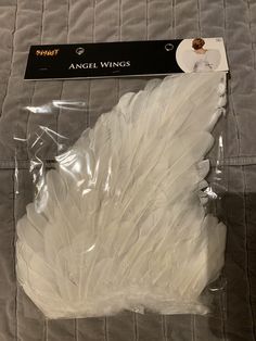 the packaging for angel wings is in plastic