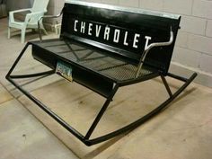 a black bench with the word chevrolet written on it