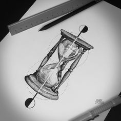 a pencil drawing of an hourglass