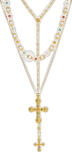 three pieces of jewelry with cross and beads on the front, one piece has a chain attached