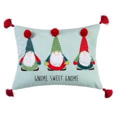 three gnomes on a pillow with the words gnome sweet gnome