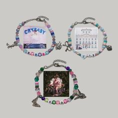 two bracelets with pictures on them and some charms hanging from the side of them