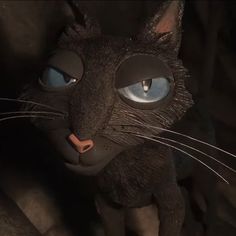 an animated cat with blue eyes stares into the camera