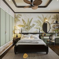 a bedroom with a bed, desk and ceiling fan in the middle is decorated with tropical wallpaper