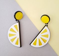 Lemon Earrings, Yellow Earrings, Dangle Drop Earrings, Stud EarringsTotal length: 3”Width: 1"* Comes wrapped in a cute little gift box, tied with lovely ribbon. Ready for gift giving. :)* All products are Lead and Cadmium Free & Nickel Safe* Care Instructions *• Limit exposure to water, hairspray, lotion, makeup, etc. • Gently clean with a jewelry polishing cloth and store in air tight plastic bag after use• Avoid wearing jewelry to bed Lemon Earrings, Pastel Earrings, Tropical Jewelry, Peach Earrings, Printable Gift Cards, Orange Earrings, Retro Earring, Yellow Earrings, Lemon Drop