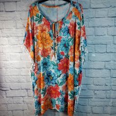 Time & Tru Floral Knit Fringe Pullover Swimsuit Coverup, Xl(16-18), Floral Multi Excellent Condition; Tags Removed, Put In Drawer & Never Worn!! *Tags/Labels Have Been Removed, Please Ask Any Questions* - Time & Tru - Xl (16-18) - White, Red, Yellow, Orange, Blue - Floral - Pullover - Caftan - Tie Neck - Fringe Trim - 93% Polyester/7% Spandex - Machine Wash Cold Multicolor Tops For Beach Season Loungewear, Casual Short Sleeve Cover-up For Loungewear, Casual Short Sleeve Loungewear Cover-up, Blue Bohemian Sleepwear For Vacation, Bohemian Blue Sleepwear For Vacation, Multicolor Beachwear Sleepwear For Vacation, Casual Blue Beach Tunic, Blue Casual Kaftan For Loungewear, Summer Beach Multicolor Sleepwear