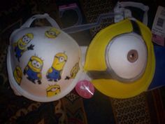 two helmets with despicable characters on them