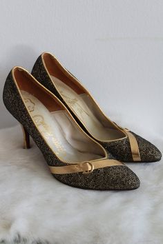 This is a vintage pair of high heel shoes. They are a deep gold/bronze tone in a metallic pattern. They also have a gold/bronze tone detail along the toe. The shoes are in good condition.Size: 5.5 NarrowInside Length: 9" | Inside Width: 3" | Outside Heel Length: 3.5" | Inside Heel Length: 2.5"Unless otherwise stated all vintage items are used and may have minor to moderate wear or discoloration considering the age of the item. Most items have been hand washed, spot cleaned, or professionally dry Metallic Pattern, Vintage Gowns, Shoes Wedding, Womens Wedding Shoes, Vintage Bridal, Chanel Ballet Flats, Heel Shoes, Salvatore Ferragamo Flats, New Vintage