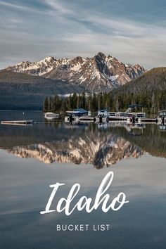 a lake with boats and mountains in the background that says idaho bucket list on it