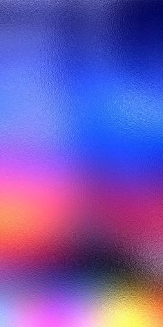 a blurry image of blue, red and yellow colors