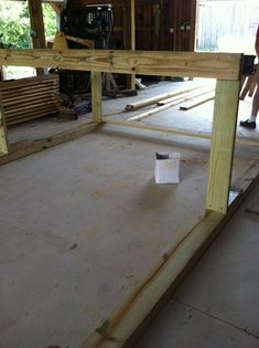 the inside of a house being built with wood framing and floor joists in place