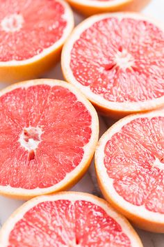 the grapefruits are cut in half and ready to be eaten for consumption