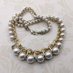 Unique faux pearl and gold tone chain necklace.  Single strand measuring 18" long.  In excellent condition.  Can be made to be more casual or dress up. Faux Pearl, Halloween Shopping, Diy Jewelry, Necklace Etsy, Vintage Jewelry, Chain Necklace, Gold Tones, Beaded Necklace, Fashion Jewelry