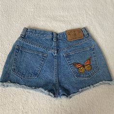 Never Worn, Vintage Denim, Great Quality, One Of A Kind Embroidery From Amazing Artist. Fits Size 24-26 Waist. Embroidered Dark Wash Bottoms For Summer, Dark Wash Embroidered Bottoms For Summer, Embroidered Medium Wash Denim Jean Shorts, Embroidered Denim Blue Jean Shorts, Casual Embroidered Cotton Jean Shorts, Casual Cotton Embroidered Jean Shorts, Medium Wash Cotton Jean Shorts With Floral Embroidery, Casual Embroidered Cutoff Jean Shorts, Embroidered Denim Jean Shorts In Blue