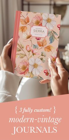 a woman holding up a pink floral book with the title 3 fully custom modern - vintage journals