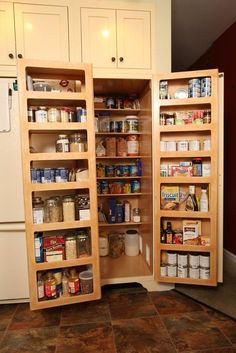 an open pantry with lots of food in it