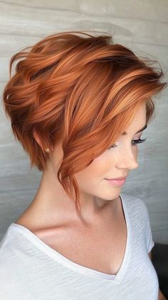 Be bold and brave with vibrant copper hair that makes a statement. Visit our site for more inspiration on how to achieve this striking transformation. Don’t forget to save this pin for your next salon visit! Copper Short Hair Color, Red With Blonde Highlights Short Hair, Copper Pixie Haircut, Copper Lowlights On Red Hair, Short Hair Styles Dyed, Copper And White Hair, Red Hair Short Bob, Copper Hair Blonde Highlights, Short Copper Bob