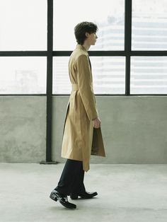 Editor's NotesThis coat is a combination of matte material and trench coat design. Waist belt offers various stylings. It can be styled in various ways.- Matte material- Trench coat design details- Waist belt- Hidden buttonMeasurements(in.)M / L- Total length: 48.82 in. / 49.21 in.- Shoulder: 18.50 in. / 19.29 in.- Chest: 20.87 in. / 21.65 in.- Hem: 25.98 in. / 26.77 in.- Armhole: 10.63 in. / 11.02 in.- Sleeve width: 7.68 in. / 8.07 in.- Sleeve length: 25.98 in. / 26.57 in.- Sleeve hem: 6.30 in. Modern Business Outerwear With Belted Cuffs, Beige Long Sleeve Outerwear With Belt, Spring Outerwear With Belt, Spring Beige Outerwear With Belt, Spring Beige Belted Outerwear, Modern Outerwear With Belt Loops For Office, Modern Belted Outerwear For Office, Modern Double-breasted Belted Outerwear, Beige Belted Outerwear For Office