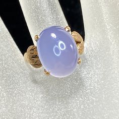 a ring with an odd shaped object on it