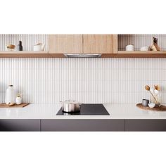 the kitchen counter is clean and ready to be used as a stove top or oven