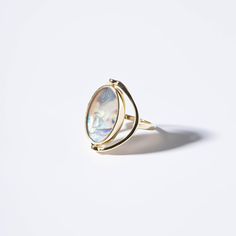 Diameters: 18.7 mm Weight: 8.5 g Plating Material: 18k Gold Decoration: Mother-of-pearlGold plated on Jewelry brass/silverDelivered in Zinfu Fine Jewelry Package. Modern Gold Oval Opal Ring, Formal Oval Pearl Ring With Polished Finish, Gold Opal Ring With Polished Finish, Gold Rings With High Luster, Elegant Gold Opal Cabochon Ring, Elegant Gold Moonstone Cabochon Ring, Oval Yellow Gold Pearl Ring With High Luster, High Luster 14k Gold Pearl Ring As Gift, Oval Pearl Ring In Yellow Gold With High Luster