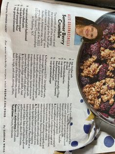 a close up of a plate of food on a table with a newspaper clipping