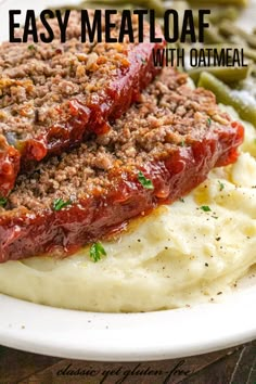 meatloaf with mashed potatoes and green beans on a white plate text reads easy meatloaf with oatmeal