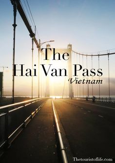 the hai van pass in vietnam with the sun setting behind it and text overlay