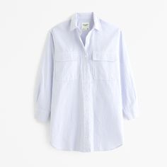 Elevate your wardrobe with the Abercrombie & Fitch Women's Oxford Mini Shirt Dress, a blend of classic style and modern comfort. This chic piece is perfect for any casual occasion or a smart-casual office setting.

- **Size**: M Petite
- **Color**: Blue Stripe
- **Material**: Cotton, Polyester
- **Gender**: Female
- **Features**: Functional button-through detail, chest pockets with flap closure, classic collar

Crafted from a premium mix of cotton and polyester, this dress offers both durability Classic Shirt Dress With Spread Collar For Day Out, Cotton Relaxed Fit Shirt Dress With Buttoned Pockets, Relaxed Fit Cotton Shirt Dress With Buttoned Pockets, Cotton Shirt Dress With Buttoned Pockets And Relaxed Fit, Classic Collared Shirt Dress With Roll-up Sleeves, Classic Shirt Dress With Roll-up Sleeves For Work, Classic Workwear Shirt Dress With Roll-up Sleeves, Classic Shirt Dress With Pockets And Spread Collar, Classic Shirt Dress With Spread Collar And Pockets