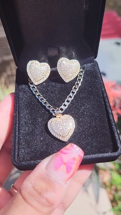 Don't miss this chance to get this stunning gold layered heart necklace with matching earrings at a bargain price. This set is a must-have for any jewelry lover, featuring a gold layered necklace with a heart pendant and a pair of earrings with heart-shaped cubic zirconia stones. The cubic zirconia stones are hand set with care and precision, creating a dazzling sparkle that mimics real diamonds. The gold layering adds a layer of elegance and durability to the jewelry, making it last longer and look more expensive. You will love how this set adds a touch of romance and glamour to your look, whether you wear it for a date night, a wedding, or a casual day out. You will feel beautiful and special every time you wear this set, and you will get compliments from everyone who sees it. This set i Xoxo Necklace, Gold Layered Necklace, Bracelet Name, Set Rings, Hugs Kisses, Buy Necklace, Set Ring, Feel Beautiful, Gold Necklace Layered