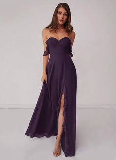 a woman wearing a purple dress with an off the shoulder slit