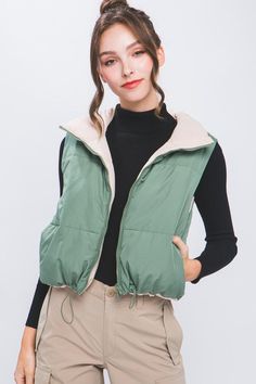 Olive Luxe Reversible Puffer Vest Made to mix and match into seasonal looks with ease, the cozy-luxe Reversible Puffer Vest is here. Featuring side pockets, front zip, and drawstring detail, pair this style with our Mock Neck Top or Ribbed Bodysuit & Straight Denim. Normal Body, Reversible Vest, Love Tree, Cropped Vest, Vest White, Modern Outfits, Puffer Vest, Easy Wear, Hat Hairstyles