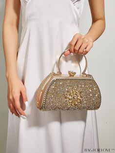 BagForLove - Rhinestone Embellished Chain Top Box Bag for a Glamorous Look Product Description Color Gold Details Rhinestone Strap Type Double Handle Bag Size Medium Style Minimalist Pattern Type All Over Print Type Box Bag Material Plastic Composition 100% Polyester Size Chart INCH CM Bag Height Bag Length Bag Width Handle Height Strap Length 5.9 inch 9.8 inch 3.9 inch 3.9 inch 46.5 inch Bag Height Bag Length Bag Width Handle Height Strap Length 15 cm 25 cm 10 cm 10 cm 118 cm Details Pictures Similar Products h2 { text-align: center; } /* æ¢è¡ */ li{ white-space: normal; word-break: break-all; word-wrap: break-word; } .red-box { width: 100%; display: flex; flex-direction: row; flex-wrap: wrap; justify-content: center; } .red-box > div { width: 190px; height: 250px; margin: 10px; } .red- Gold Crystal Bags For Prom, Glamorous Gold Bags With Rhinestones, Gold Handheld Evening Bag With Rhinestones, Gold Embellished Bags For Prom, Gold Crystal Clutch Bag, Gold Crystal Evening Bag For Prom, Gold Rectangular Crystal Clutch, Glamorous Gold Crystal Bags, Gold Crystal Embellished Clutch