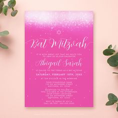 a pink and purple bat mittensh party card on a table with greenery