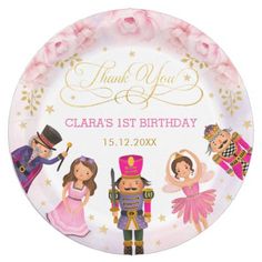 a pink and gold birthday plate with princesses on it