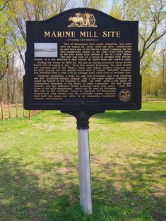 the marker for marine mill site is located in an open field with trees and grass