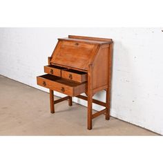 an old wooden desk with two drawers