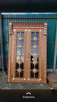 an old wooden door with decorative designs on it