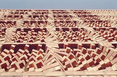 an intricately designed wooden structure in the desert