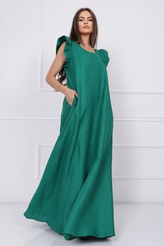 "Discover the epitome of effortless elegance with our green maxi linen dress for women. This dress offers a perfect blend of comfort and style, making it an ideal choice for those who appreciate minimalist fashion without compromising on sophistication. Crafted from high-quality linen, this sleeveless dress is designed to keep you feeling comfortable and chic, whether you're enjoying a casual day out or dressing up for a special occasion. Features: 🌟 Refreshing Green Hue: The refreshing green c Solid Linen Maxi Dress For Spring, Green Linen Beach Dress Elegant, Elegant Green Linen Beach Dress, Spring Green Linen Maxi Dress, Green Maxi Linen Dress For Spring, Spring Green Maxi Linen Dress, Green Linen Maxi Dress For Summer, Casual Green Linen Maxi Dress, Green Casual Maxi Linen Dress